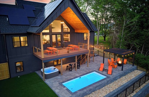 Shenandoah Ski Chalet | TWIN CHALETS, Riverfront w/2 Pools, 2 Hot Tubs, Sauna, EV Chargers, AMAZ Views
