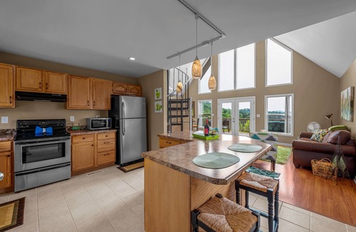 Sevierville Ski Chalet | Unforgettable Sunrise View, Dual Living Spaces & on Douglas Lake by Pigeon Forge