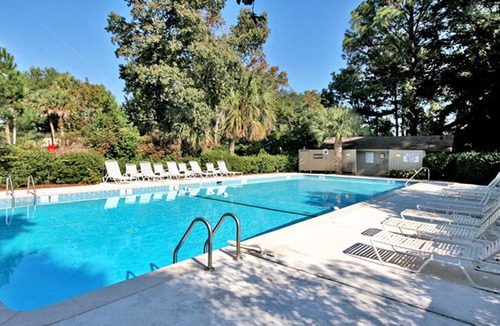 Night Heron House | Waterfront getaway in heart of Sea Pines - short walk to beach & steps to pool
