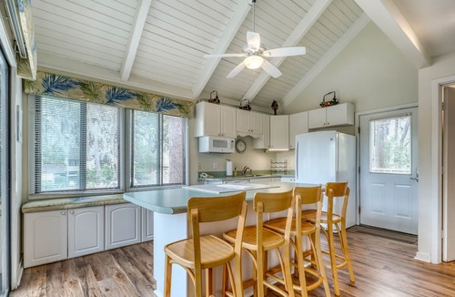 Night Heron House | Waterfront getaway in heart of Sea Pines - short walk to beach & steps to pool