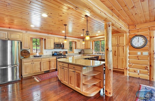 Whitewater House | Waterfront, Hand-Crafted Log Cabin |Sandy Beach |Dock |5200 Sq Ft |3.5 Acres |Stone Fireplace |Views