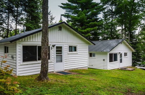 Gwinn Cottage | Wooded Lakeside Cottage ,Fishing, Snowmobiling, Hunting, Boats, Hot Tub