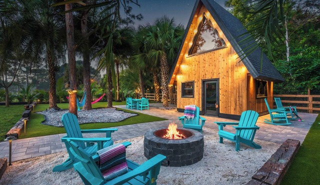 A-Frame Tiny House on Palm Tree & Alpaca Farm w/Fire Pit, Mini Golf, Swings in Palm Beach Gardens