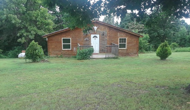 Cedar cabin located on a buffalo farm in Marshall