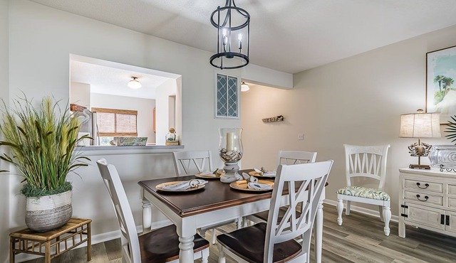 First Floor Condo - Walking distance to beach and pools!