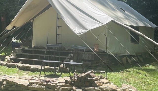 Glamping tent overlooking pond