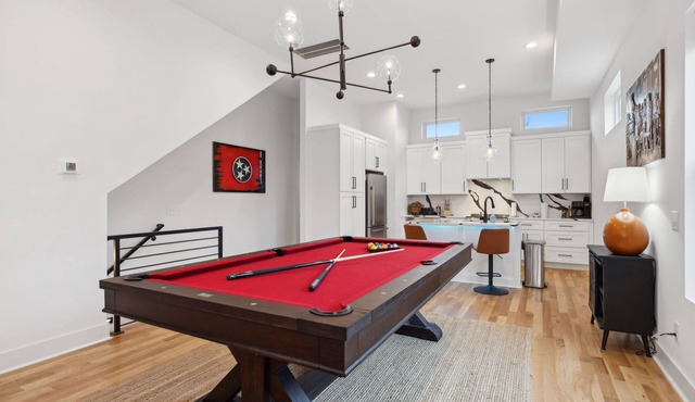 Modern and sleek unit near Downtown with billiards