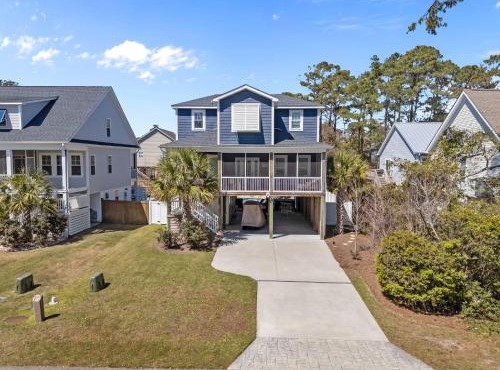 Pool Spa Fire Pit & More at this OKI Escape in Oak Island