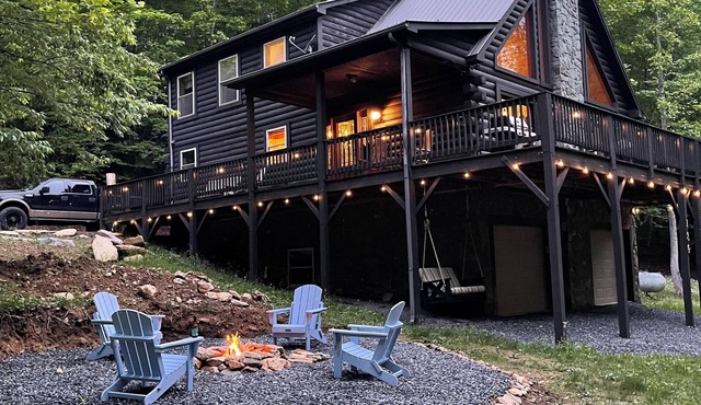 Serene Creek Cabin w/Fire Pit, Air Hockey, Pool, Yard, Pet Friendly near Todd!