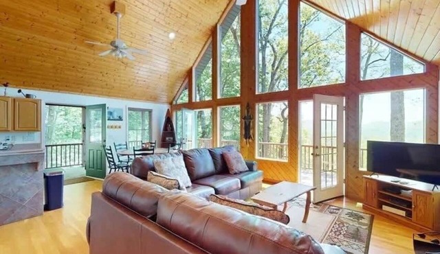 Stunning mountain views, family-friendly cabin, hot tub, kayaks, on two acres