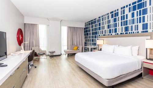 King Room with Roll-In Shower and City View - Mobility and Hearing Accessible