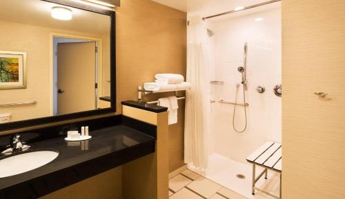 Queen Suite with Two Queen Beds, Roll-In Shower and Sofa Bed - Mobility Access/Hearing Accessible