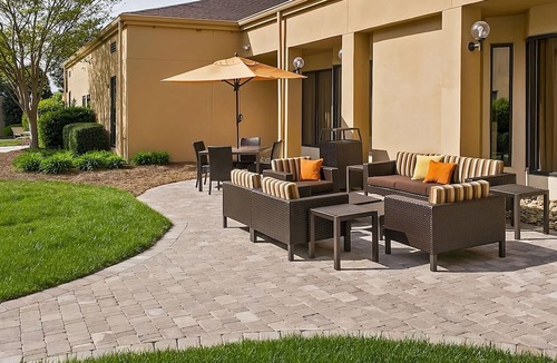 University Place Hotel | Minutes to Charlotte Motor Speedway! Pet-friendly Property!