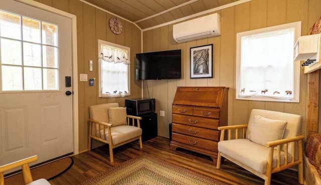 Enjoy this cabin/tiny home on 24 acres of oak and hickory forest close to Berkeley Springs, WV